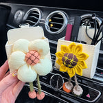 Boîte de rangement de sortie d'air de fleur de voiture