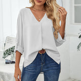 Chemise élégante ample à col en V