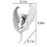 Ornement d'ange tenant une jambe