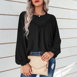 Chemisier uni à manches bouffantes et encolure ronde