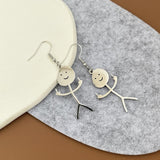 Boucles D'oreilles Drôles De Griffonnage