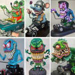Statues de monstre à grande bouche en colère