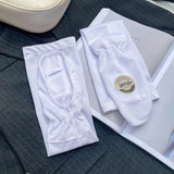 Manchettes solaires en soie glacée