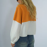 Manteau en molleton à empiècements multicolores