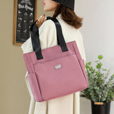 Sac à main polyvalent simple en nylon de couleur unie avec une grande capacité