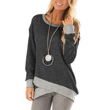 Haut à manches longues irrégulières à col rond et grande taille