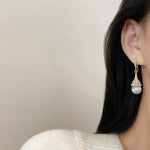 Boucles D'oreilles En Perles D'opale Á La Mode