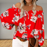 Haut fleuri à épaules dénudées et ourlet volanté