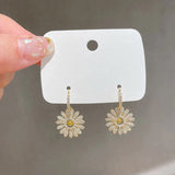 Boucles d'oreilles marguerites élégantes