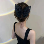 Grande pince à cheveux avec pompon et découpe papillon