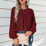 Chemisier uni à manches bouffantes et encolure ronde