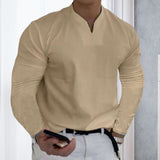 T-shirt business de couleur unie avec col en V et manches longues