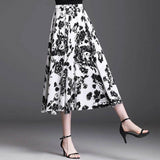 Jupe trapèze mi-longue coupe ajustée élastique simple