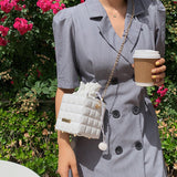 Sac à bandoulière à carreaux avec cordon de serrage