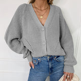 Pull en Tricot Boutonné à Manches Bouffantes et Col en V de Couleur Unie