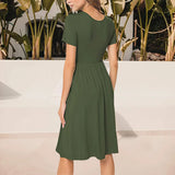 Robe à col ras du cou avec poche