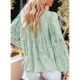 Elégant chemisier unicolore à manches longues