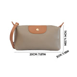 Pochette en cuir légère avec grand espace et fermeture éclair au poignet