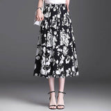 Jupe trapèze mi-longue coupe ajustée élastique simple