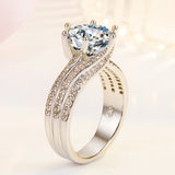 Bague six griffes classique torsadée en diamant