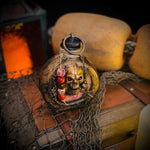 Bouteille de rhum tête de mort pirate en résine