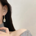 Boucles D'oreilles En Perles D'opale Á La Mode