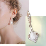 Boucles d'Oreilles Oeil de Chat Brillantes