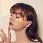 Boucles d'oreilles chat avec livres
