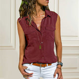 Chemisier uni sans manches avec poches