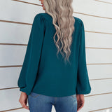 Chemisier uni à manches bouffantes et encolure ronde