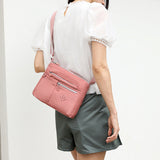 Sac à bandoulière léger avec plusieurs poches pour femme