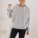 Sweat à capuche de couleur unie