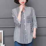 Chemisier à rayures et col montant à manches 3/4