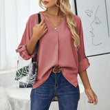 Chemise élégante ample à col en V