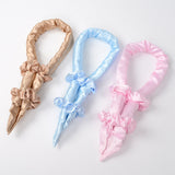 Fer à friser éponge