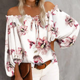 Haut fleuri à épaules dénudées et ourlet volanté