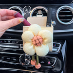 Boîte de rangement de sortie d'air de fleur de voiture