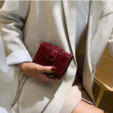 Mini sac à cosmétiques à bandoulière