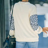 Chemise à col rond et manches longues contrastées