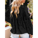 Elégant chemisier unicolore à manches longues