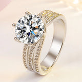 Bague six griffes classique torsadée en diamant