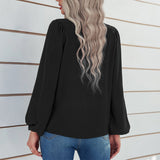 Chemisier uni à manches bouffantes et encolure ronde