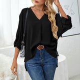 Chemise élégante ample à col en V