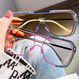 Lunettes de soleil à grande monture