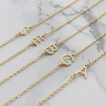 Collier à diamants avec lunette pour les initiales