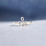 Bague enveloppante croix micro pavée