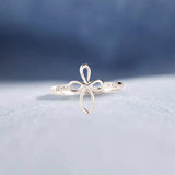 Bague enveloppante croix micro pavée