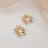 Boucles d'oreilles élégantes en perles