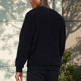 Pull ample à col montant en peluche