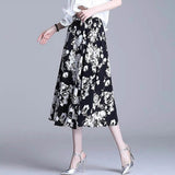 Jupe trapèze mi-longue coupe ajustée élastique simple